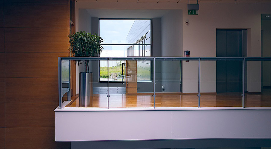 Modern office interior with glass railings