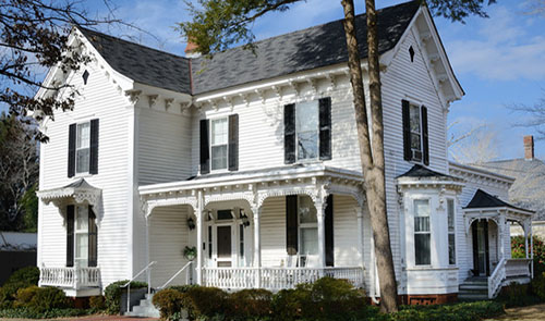 White heritage-style house exterior